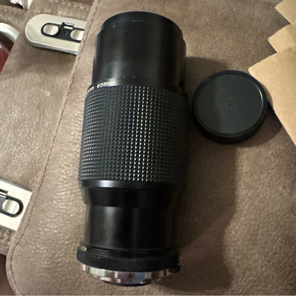 Black Telephoto Zoom Lens with Knurled Focusing Ring